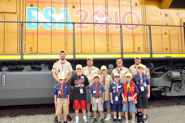 Scouts-engine.jpg - Cub Scouts and their leaders along side the 2010.  This is the BSA engine.