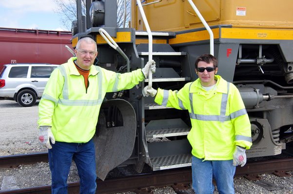 Dave-H-&-son-CNW.jpg - Engineer Dave Hawley and Conductor Kevin Hawley.