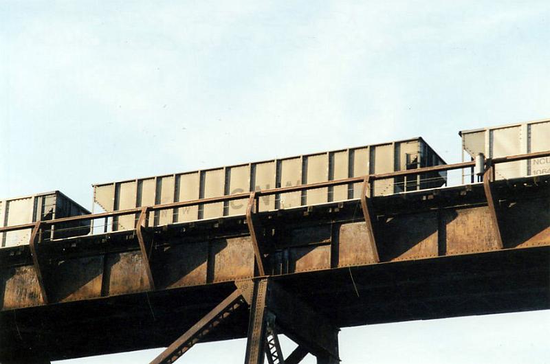 043.jpg.jpg - While in Boone in November 2005, Wally visited the Kate Shelly Bridge, getting this picture of a C&NW hopper car in an eastbound coal train.