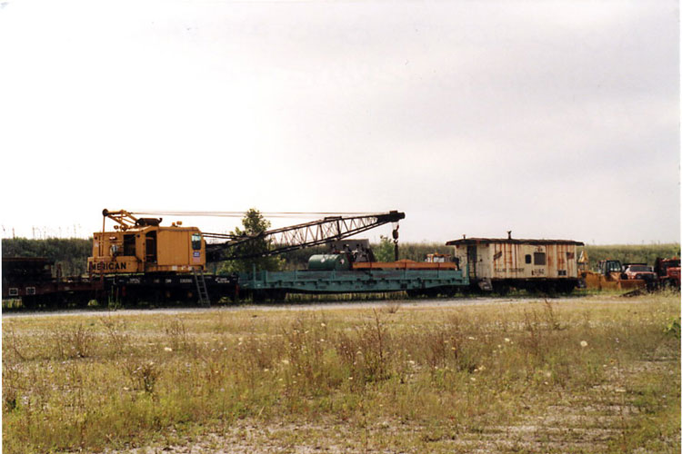 072.jpg - At the Bain Yard during August 2007, Wally caught this crane and waycar - both still lettered C&NW.