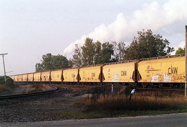 130.jpg - An eastbound manifest with 20 C&NW hoppers at Bain, Wisconsin, October 2008.
