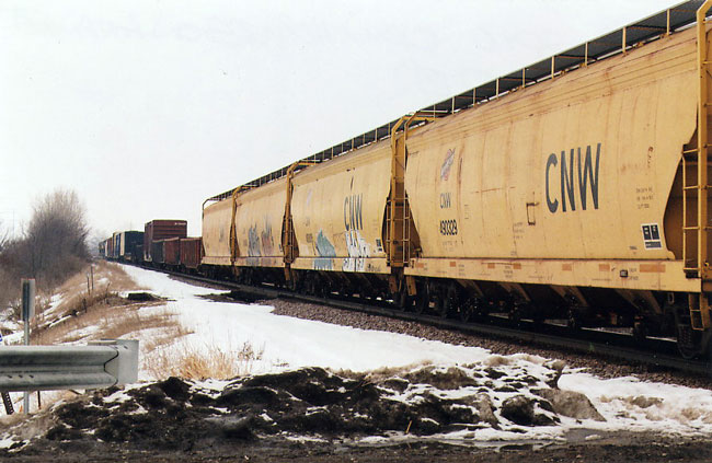 174.jpg - C&NW covered hoppers at Bain on their way to Butler.