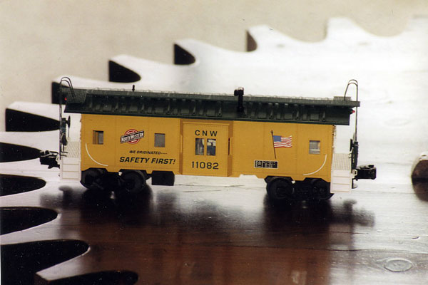 099.jpg - Models of 3 C&NW way cars coming up.  Wally used the 11082 at Bain & Kenosha.  May 2008.