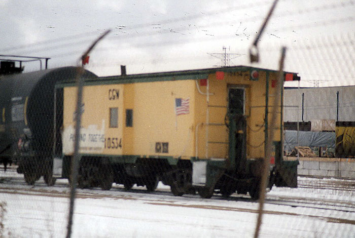 175.jpg - C&NW waycar at Bain still lettered as CGW.  February 2010.