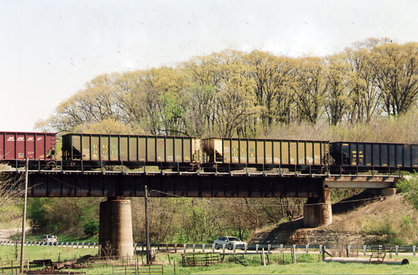 180.jpg - April 2010 - A BNSF empty ore train with several C&NW hoppers.