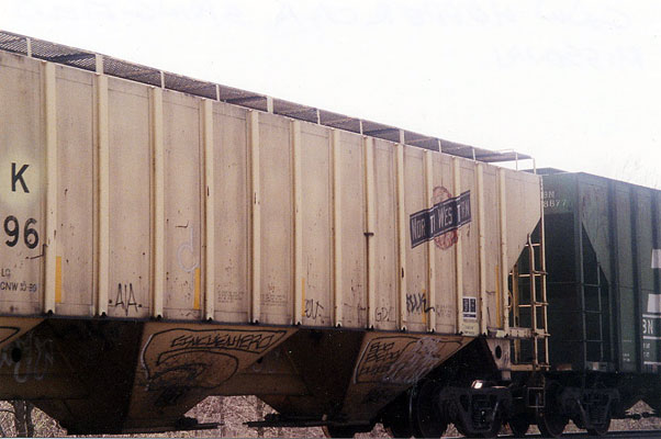 201.jpg - A C&NW hopper car rolling through Springfield, MO.