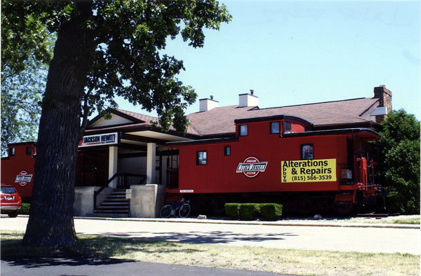 222.jpg - From Galesburg, IL Railroad Days in June 2012 - 2 C&NW way cars.  One is hiding behind the tree.