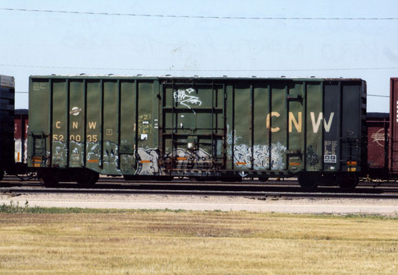 233.jpg - A C&NW box car is making its way through Bailey Yard.