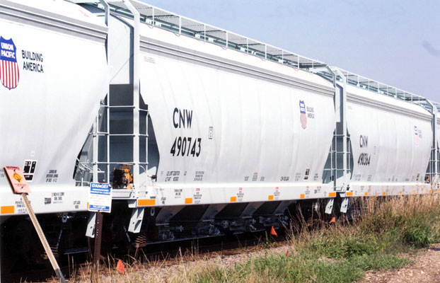 234.jpg - Some C&NW Covered hopper cars passing through Butler Yard in September 2012.