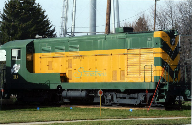 239.jpg - Wally found “C&NW 10,” a Fairbanks Morse H-12-44, on display at Milton, WI in November 2012.  Owned by the Liberty Station Restaurant, it was originally Minneapolis, Northfield & Southern 10 and was later acquired by the Central of Wisconsin R.R.  It was never a C&NW engine, but we do approve of the  restoration & paint job.  Look close and you can see "Route of the Streamliners" on the side.