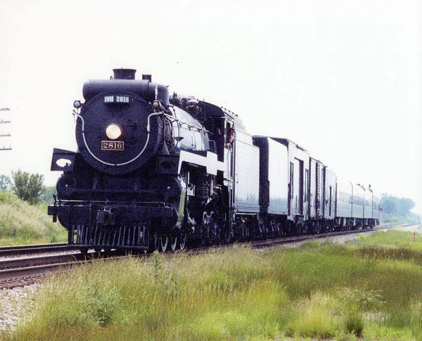CPR-2816A.jpg - Canadian Pacific Engine 2816 is shown here at Highway A with enroute to Calgary, Alberta.  This movement took place in October 2006.