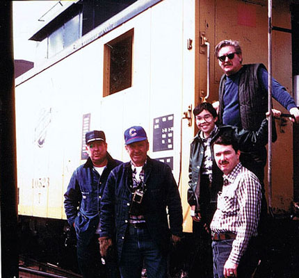 Unidentified1.jpg - One of the Elk Grove jobs.  Gordie Johnson, Windy, Tom Murphy's son Tom, Tom Murphy (Engineer in the checkered shirt) and  Danny Shea.   Danny on the platform of this ex-CGW way car.